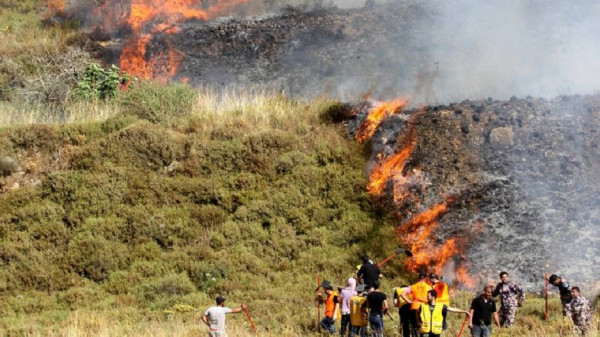 مستوطنون يحرقون أراضٍ بنابلس والاحتلال يصادر آلية برام الله