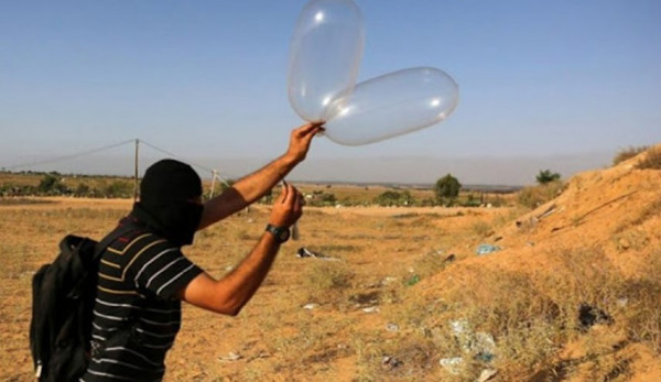 (البالونات المفخخة) تجاه مستوطنات الغلاف تُسيطر على عناوين الصحف الإسرائيلية