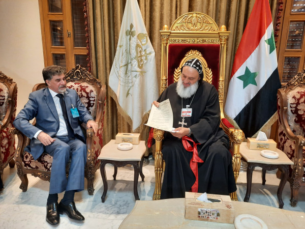 السفير عبد الهادي يسلم البطريرك أغناطيوس أفرام الثاني رسالة من رمزي خوري