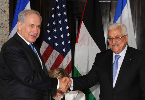 بايدن والتنسيق الأمني وطاولة المفاوضات يؤجلون المصالحة الفلسطينية