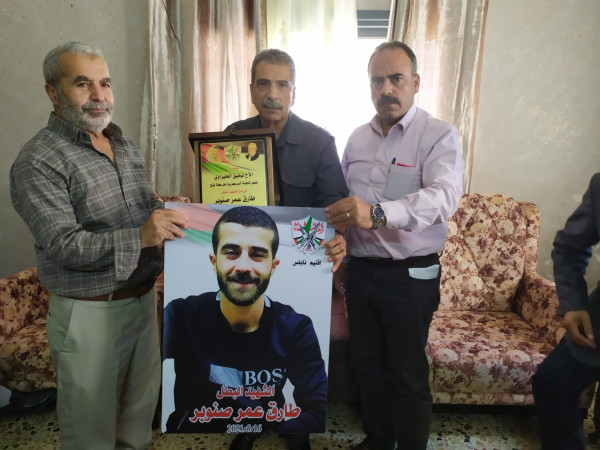 فتح "بنابلس" تنظم زيارات لذوي شهداء معركة الدفاع عن القدس