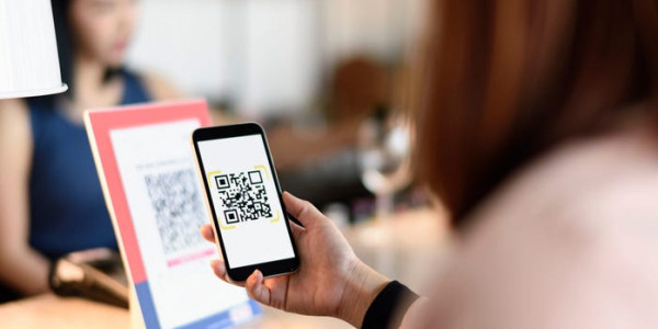 ابتكار جهاز يتعرف على شيفرة التطعيم (QR)