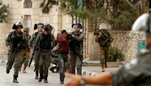 الاحتلال يعتقل 14 مواطناً في مناطق متفرقة بالضفة الغربية