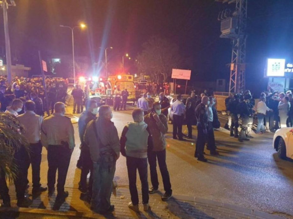 شاهد: قتيل ومصاب في جريمة إطلاق نار بأراضي 48