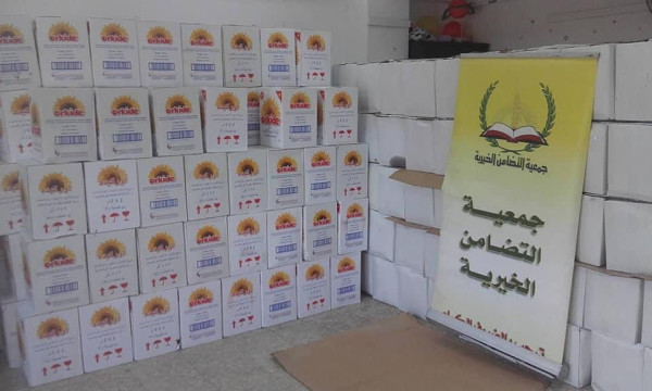 التضامن الخيرية توزع طرود غذائية وكسوة العيد على 6000 أسرة في نابلس