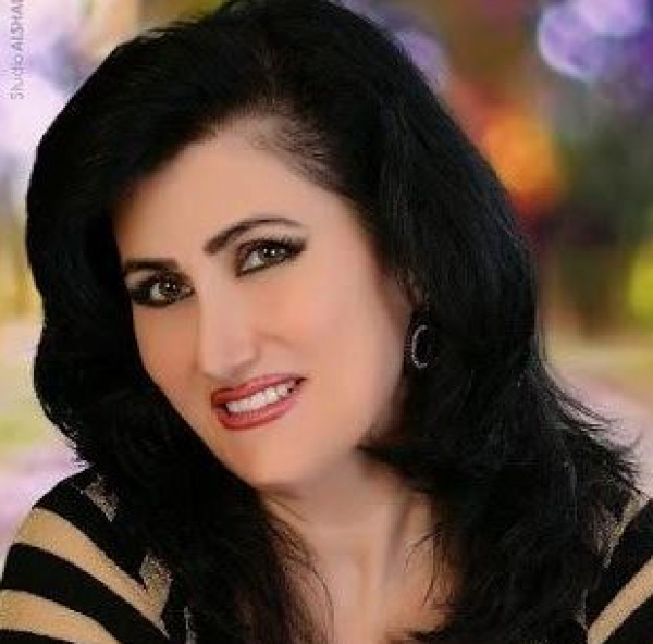 الشاعرة السورية ملكة الأسد تكتب للحب والوطن في زمن الحرب بقلم : شاكر فريد حسن